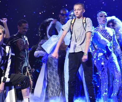Backpack Kid Russell Horning teaching Gita Cellei the Floss dance
