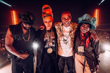Wyclef Jean, Erykah Badu, Dave Chappelle and Lauryn Hill pose together at Diaspora Calling 2026 at Milton Keynes National Bowl