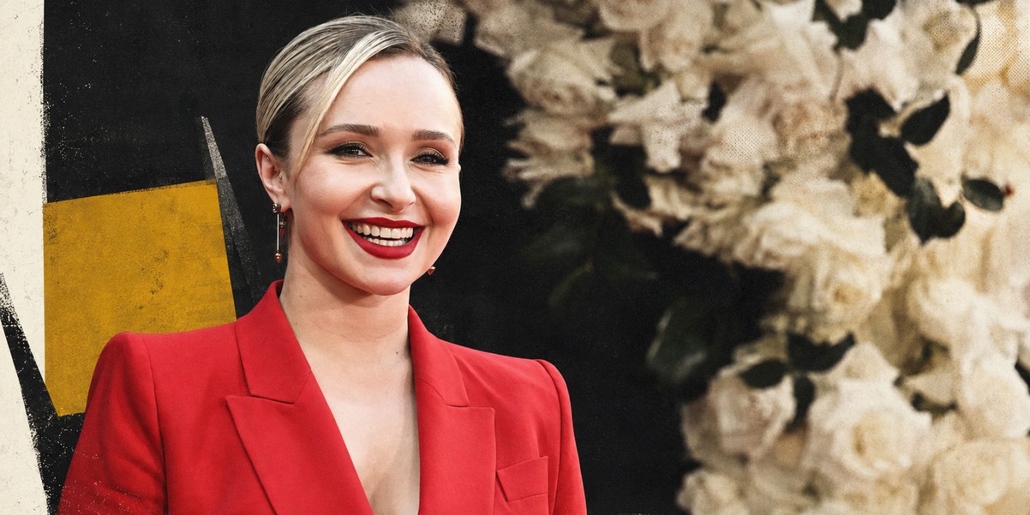 Hayden Panettiere smiling in a red suit at a red-carpet event