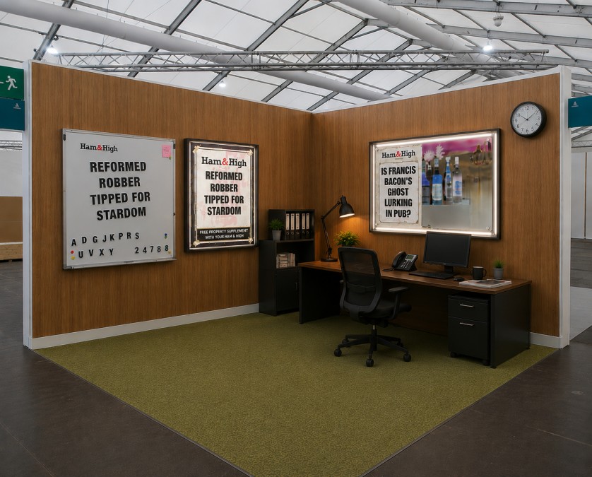 Marcus Jefferson's Frieze London 2026 booth concept featuring wood-panelled office walls, satirical newspaper posters and a desk.